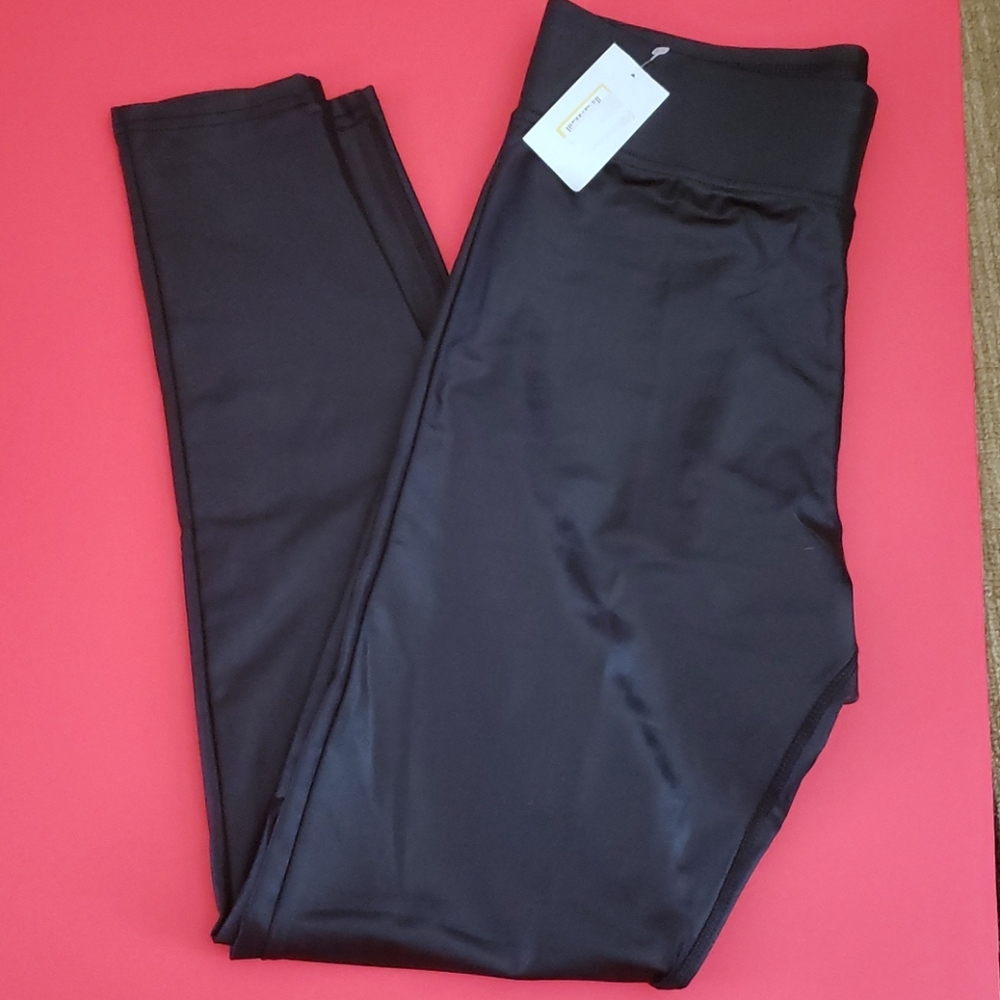 Shiny black pants. Size M